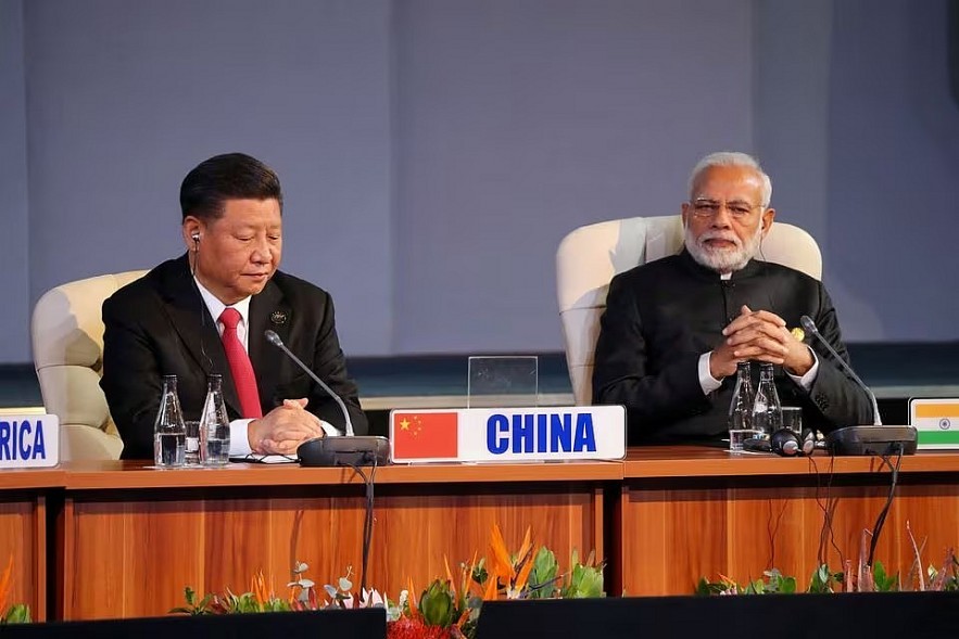 Indian Prime Minister Narendra Modi and China's President Xi Jinping attend a BRICS summit meeting in Johannesburg, South Africa, July 27, 2018. REUTERS