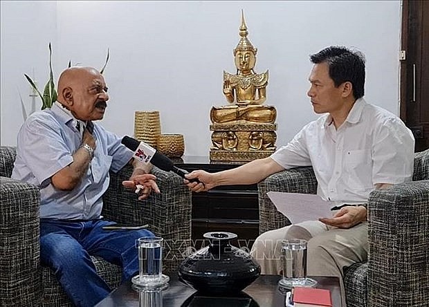 Former Deputy National Security Advisor of India SD Pradhan (L) in an interview with the Vietnam News Agency (Photo: VNA)