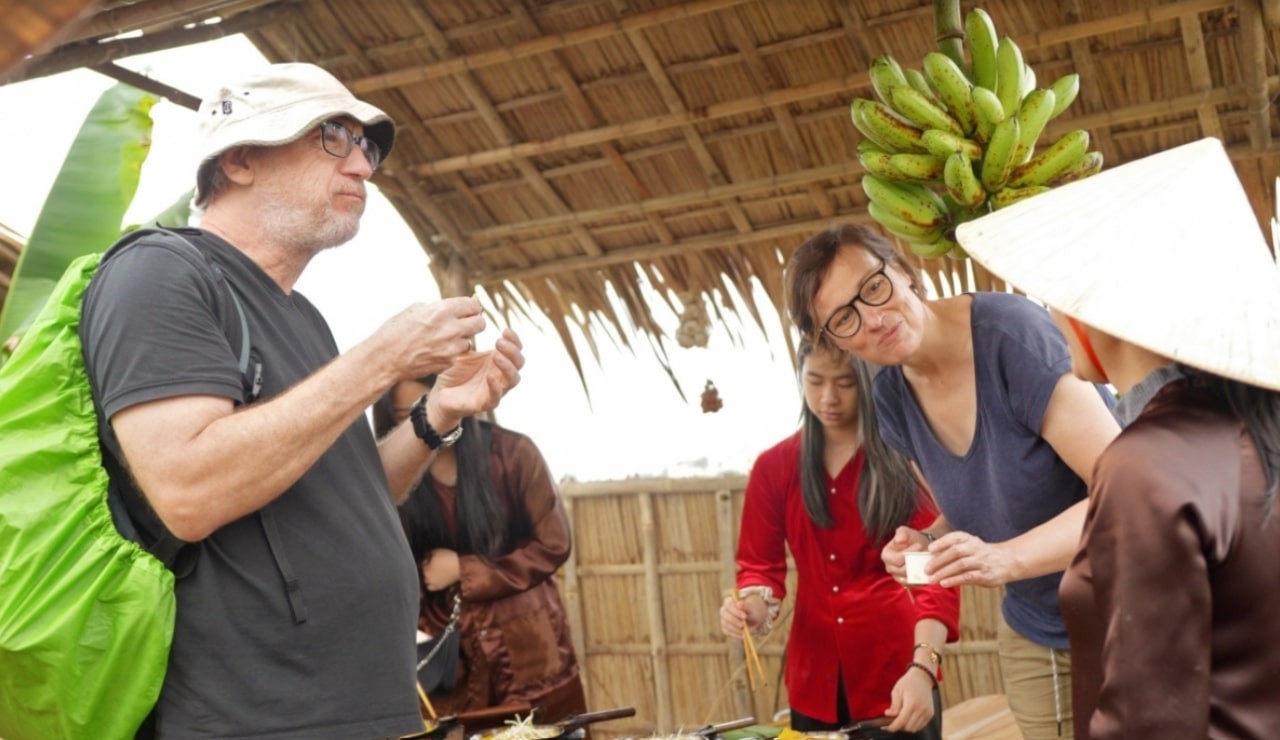 International Tourists Experience Working On Hoi An Rice Fields