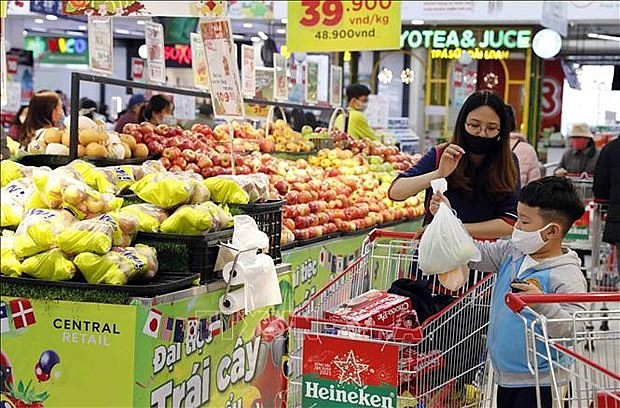 Businesses have committed to launching an array of price stabilisation and promotion programmes in the runup to Tet. (Photo: VNA)
