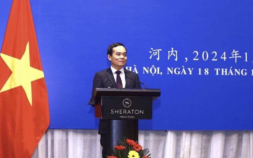 Vietnamese Deputy Prime Minister Tran Luu Quang speaks at the reception marking 74 years of diplomatic relations between Vietnam and China, held at the Chinese Embassy headquarters in Hanoi on January 18. (Photo: VNA)