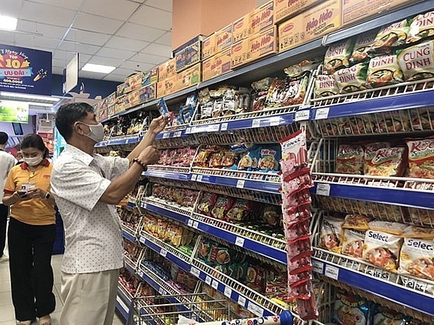 Customers shop at a supermarket in HCM City. Several key macro trends are shaping Vietnam's FMCG landscape in 2024 and beyond. (Photo: VNA)