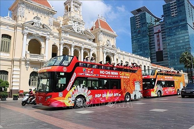 Sightseeing double-decker bus tours in HCM City (Photo: VNA)