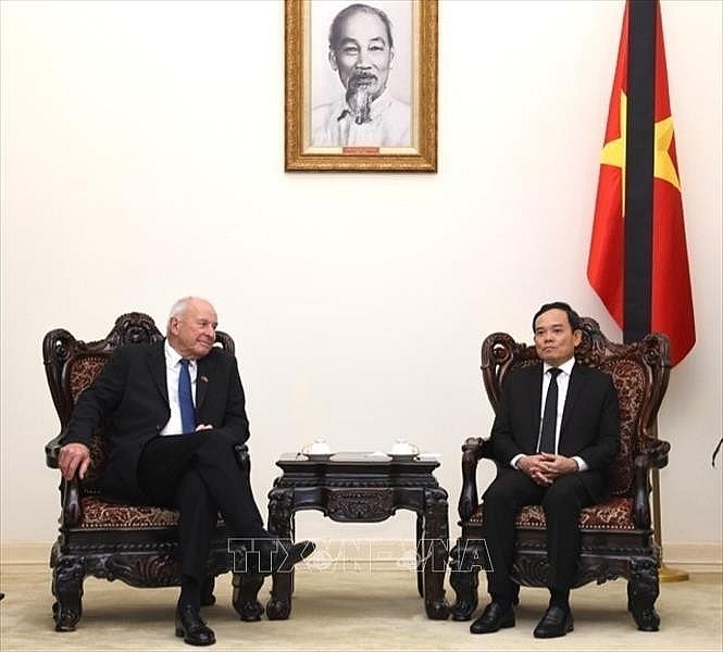 Vietnamese Deputy Prime Minister Tran Luu Quang and New Zealand Special Envoy Donald McKinnon at the meeting. (Photo: VNA)