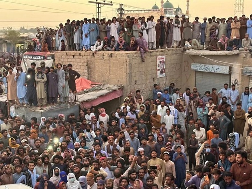 Baloch people sit-in protest (File Photo/X @BalochYakjehtiC). Image Credit: ANI