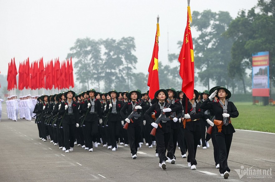 Female militia members from Southern Vietnam rehearse for the 70th anniversary of the Dien Bien Phu Victory. Photo: Pham Hai.