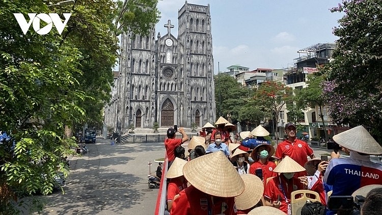 Tourists visit St. Joseph's Cathedral (Nha Tho Lon) in Hanoi.