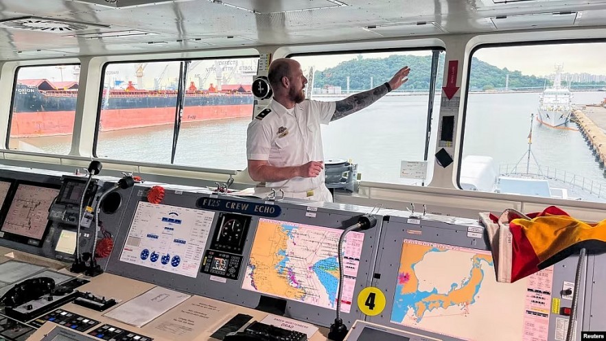 FILE - A German naval officer stands on the bridge of the frigate FGS Baden-Wurttemberg, docked in Incheon, South Korea, Sept. 6, 2024. It is one of two German naval vessels en route from South Korea to the Philippines through the South China Sea.