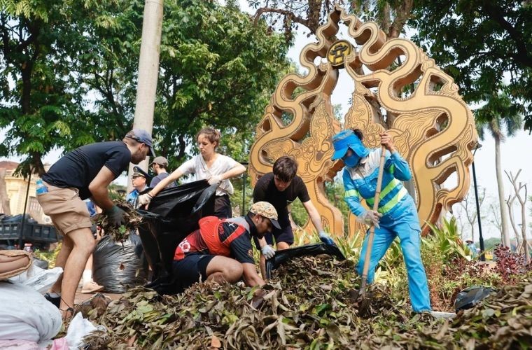 n areas across Hanoi where fallen trees are scattered, foreign volunteers from various countries are teaming up with local residents to clean up debris, restore the environment, and address the aftermath of Typhoon Yagi.