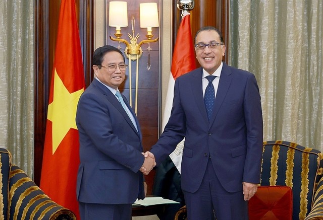 Prime Minister Phạm Minh Chính (left) meets with his Egyptian counterpart Mostafa Madbouly in Riyadh on Tuesday (local time), on the occasion of his participation in the 8th Future Investment Initiative (FII) Summit and his working visit to Saudi Arabia. — VNA/VNS Photo Dương Giang