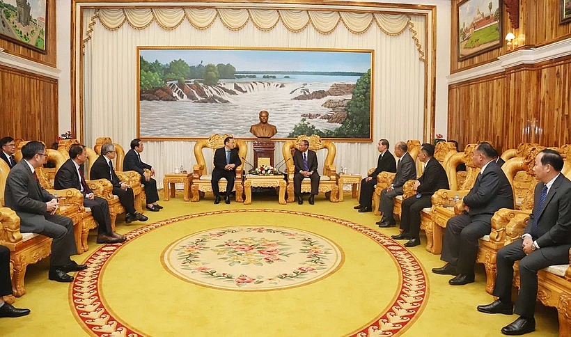 Participants at the conference in Vientiane on December 20 to review the progress of a project on building a resident and citizen identity management system in Laos (Photo: VNA)