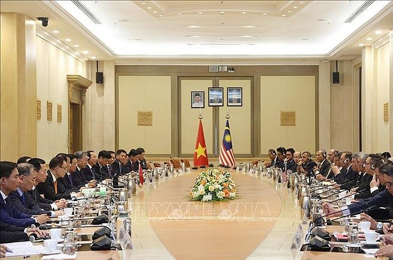 Reviewing Vietnam's upgraded relations with partners in 2024