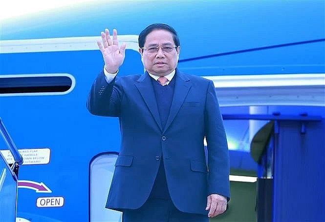 Prime Minister Pham Minh Chinh leaves for a working trip to Laos (Photo: VNA)