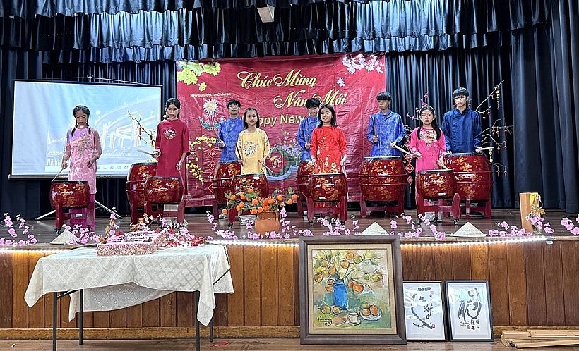 A drum performance by children at the Tet celebration held by New Sunlight for Children. (Photo: VNA)