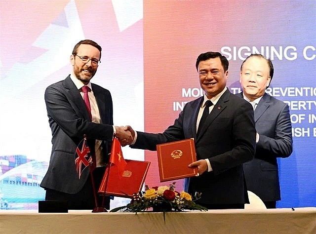 An MoU on preventing counterfeit and IP infringement in Vietnam was signed at the conference, 'The UK’s Accession to CPTPP' organised on February 19 in Hanoi. (Photo courtesy of British Embassy in Vietnam)