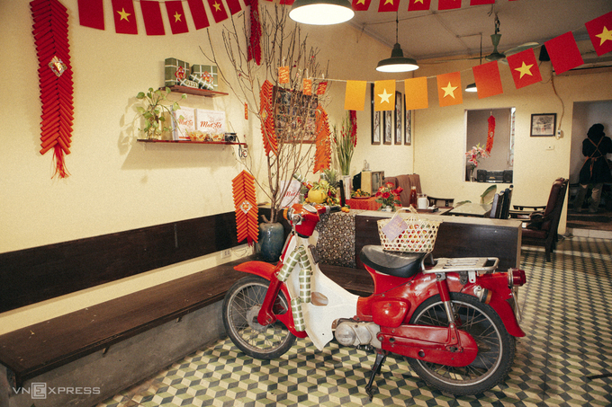 four coffee shops with tet holiday themed decorations in hanoi