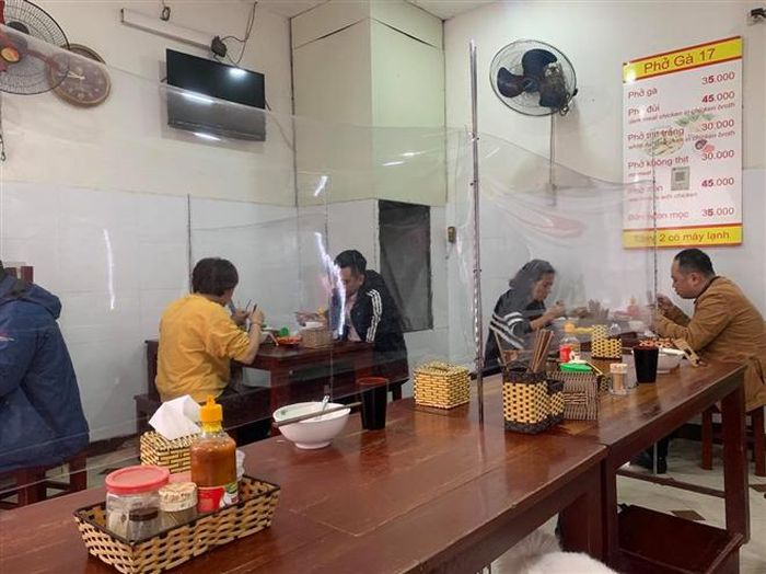 hanoi eases social distancing allowing indoor restaurants and cafes to reopen
