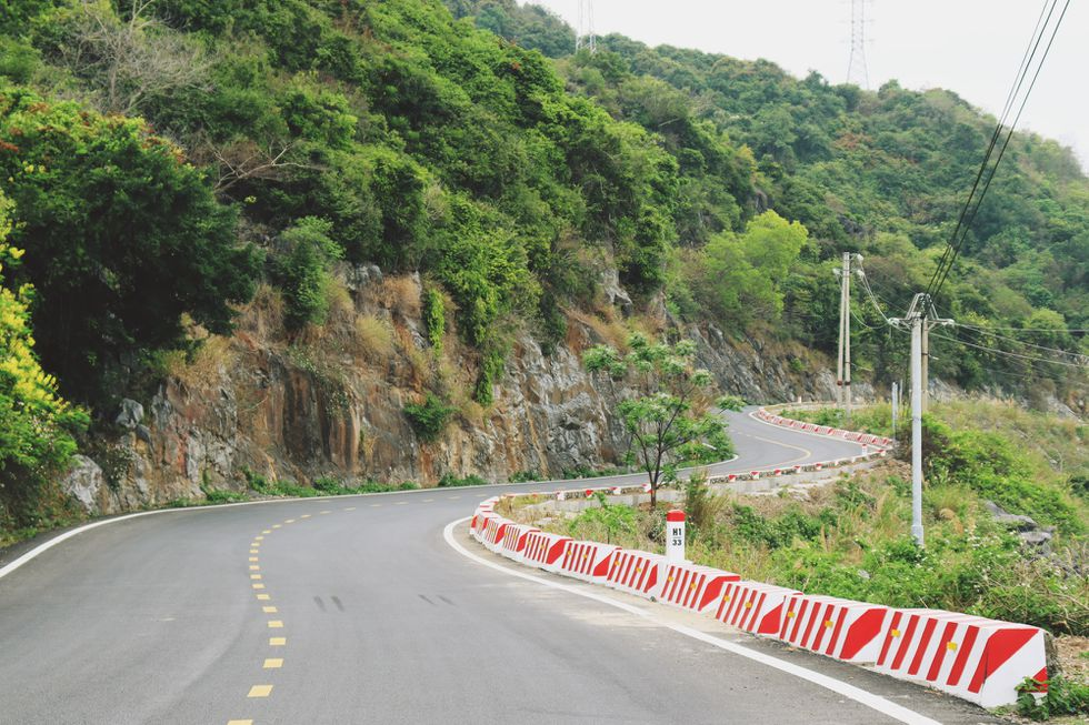 Coastal road in Cat Ba Island, a 'not-to-be-missed' destination for backpackers