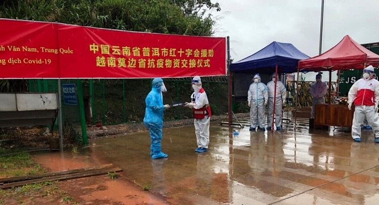 china laos present medical supplies to assist vietnams covid 19 fight