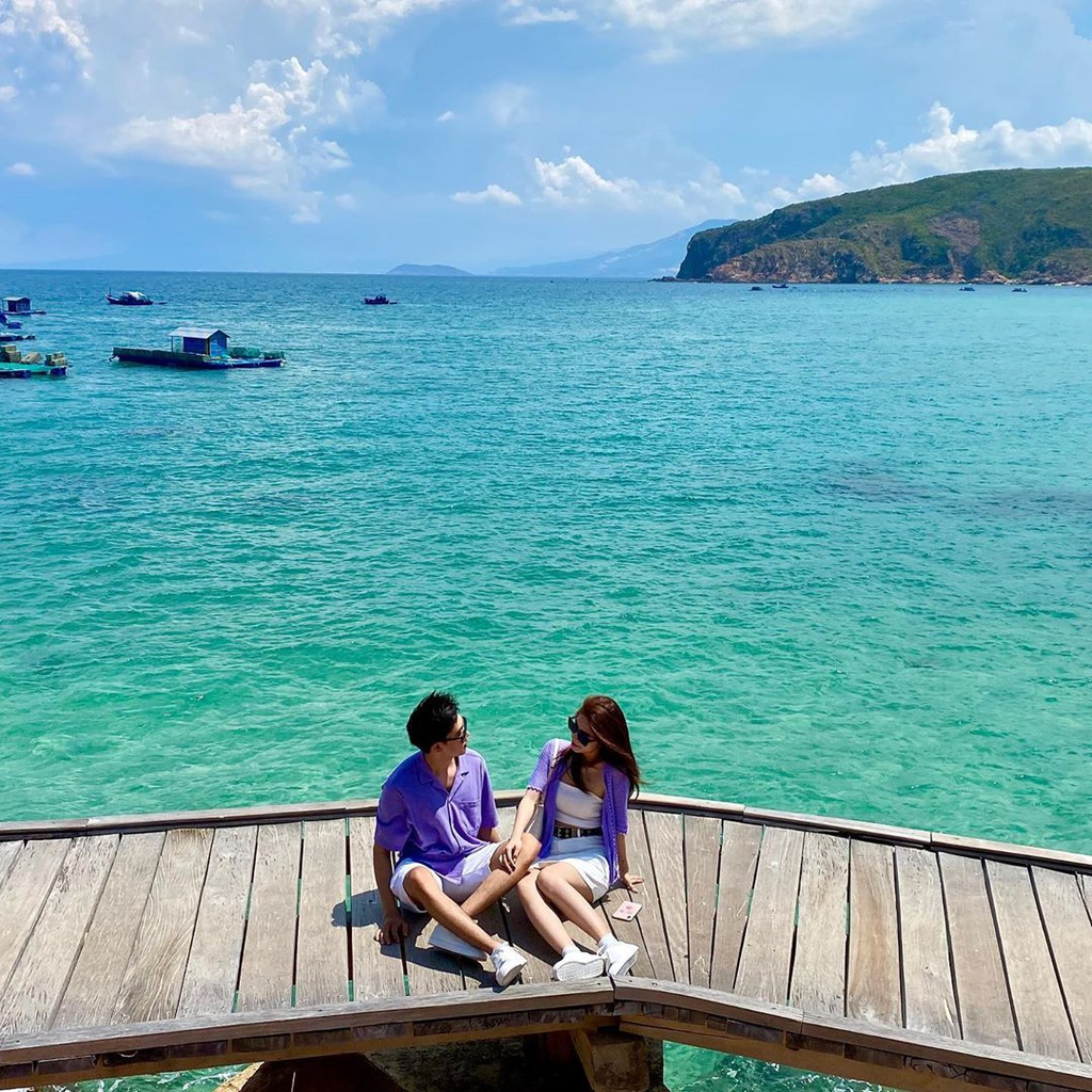 alluring wooden bridges amidst blue sea in vietnams famous tourism hub