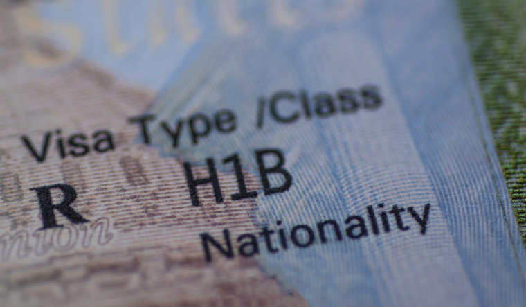 What is H-1B visa programme suspended by Trump? 