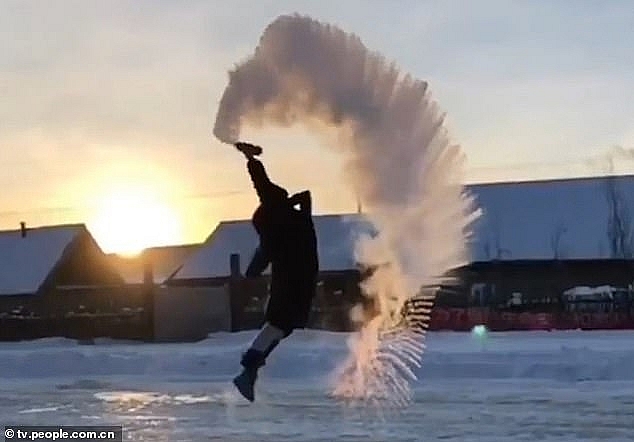 Mesmerizing scene as hot water thrown into frozen air