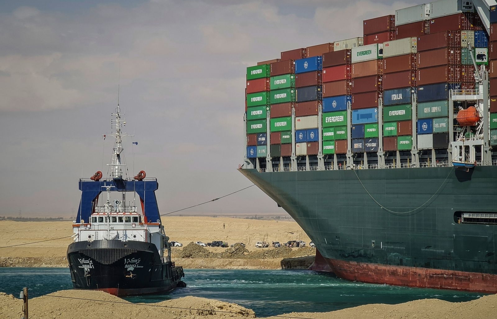 giant container ship stuck is causing traffic jam on suez canal