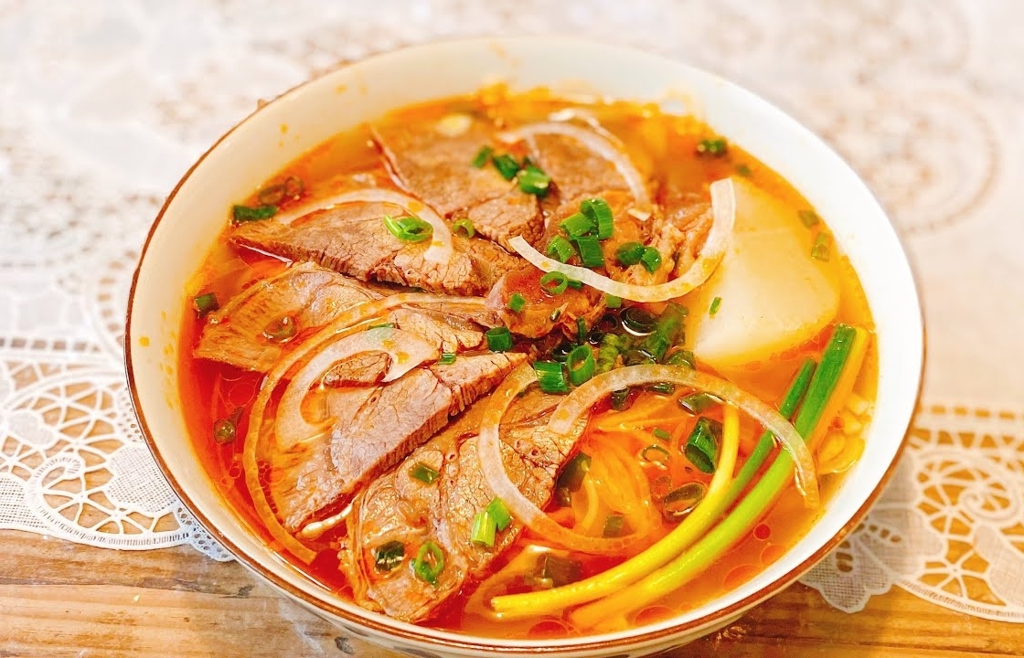 Homemade recipe for 'Bun Bo Hue' (Hue style beef noodle soup) with popular ingredients