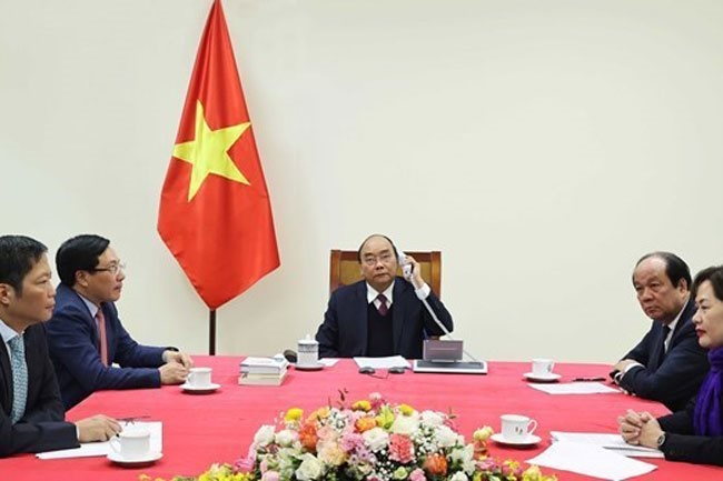 Prime Minister Nguyen Xuan Phuc holds a telephonic talk with U.S. President Donald Trump - PHOTO: VNA 