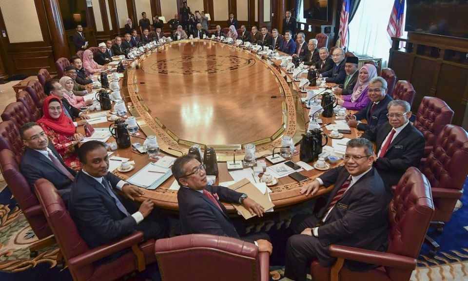 Prime Minister Tan Sri Muhyiddin Yassin poses with Cabinet ministers before its first meeting at Perdana Putra in Putrajaya March 11, 2020 (Photo: Bernama pic)  