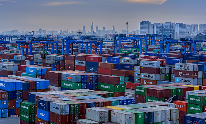 Shipping containers at a port in Ho Chi Minh City. Photo by Shutterstock/Igor Grochev.