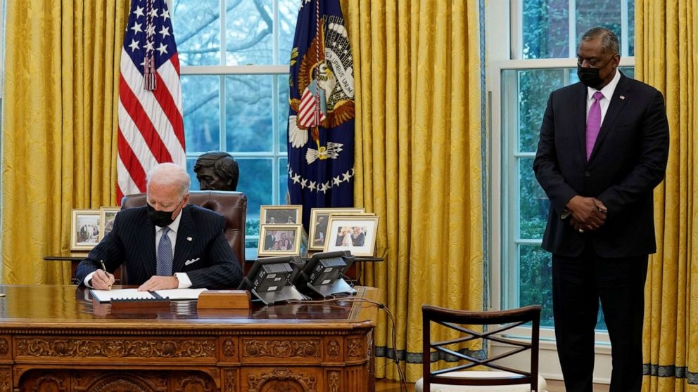 President Joe Biden meets with new U.S. Defense Secretary Lloyd Austin in the Oval Office at the White House in Washington, D.C., Jan. 25, 2021. 