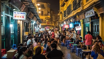 Vietnam's capital asks for closure of karaoke parlors, bars to curb COVID-19