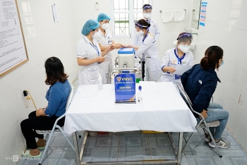 vietnam launches biggest vaccination campaign against covid 19 in photos