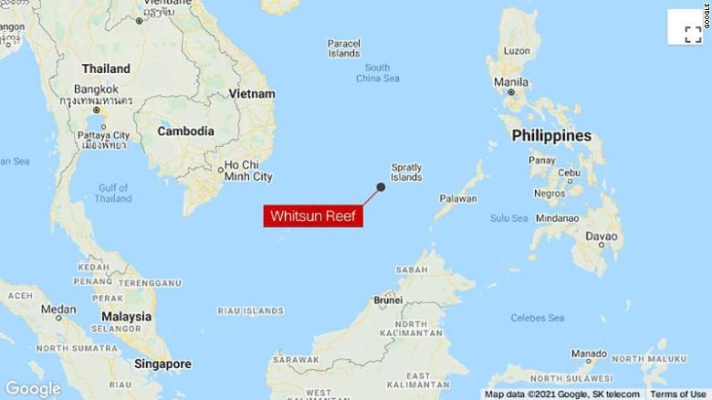 world breaking news today march 23 philippines demands chinese fishing flotilla leave disputed south china sea reef