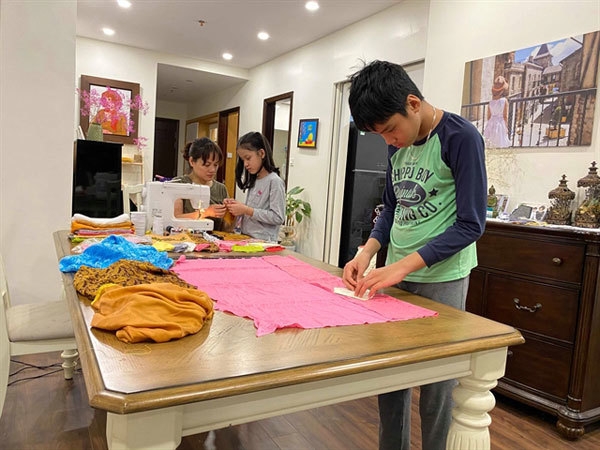 vietnamese young beauties look more attractive with fashioned face masks