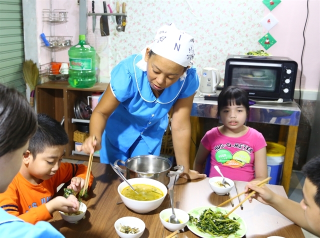 japanese teacher bridges gap with vietnamese children with autism