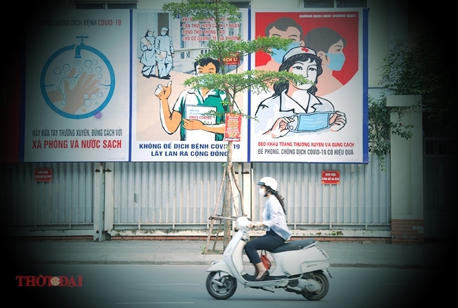 posters raise public awareness of covid 19 prevention in vietnam photos