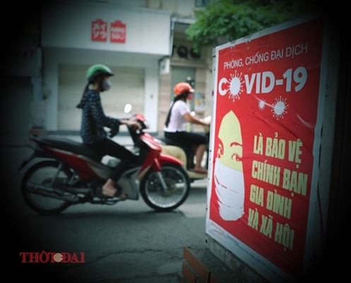 posters raise public awareness of covid 19 prevention in vietnam photos