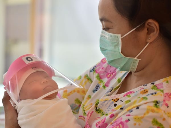 hanoi newborns get face shields for covid 19 protection