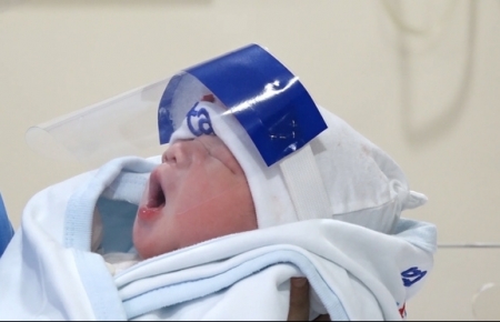 Vietnam newborns get face shields for COVID-19 protection