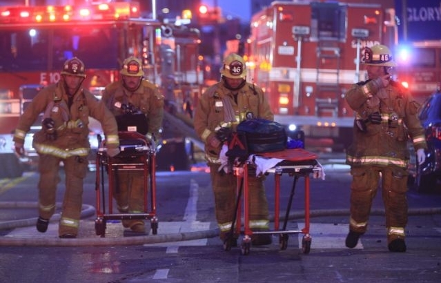 World news today:  Fire and explosion rip through downtown L.A, 11 firefighters injured