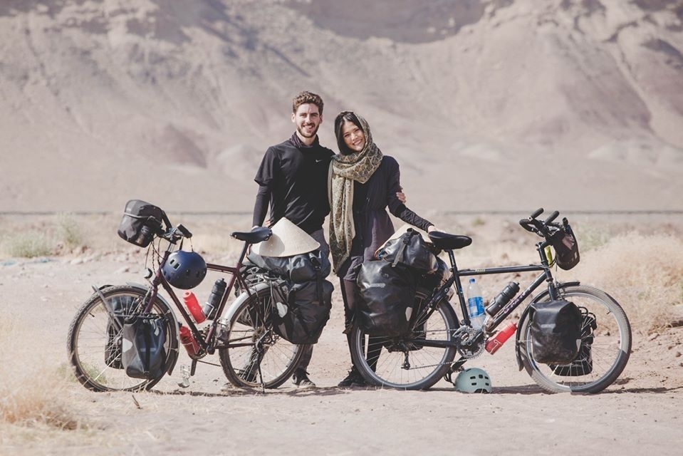 newly wedded couple cycles pass 18 countries to raise fund