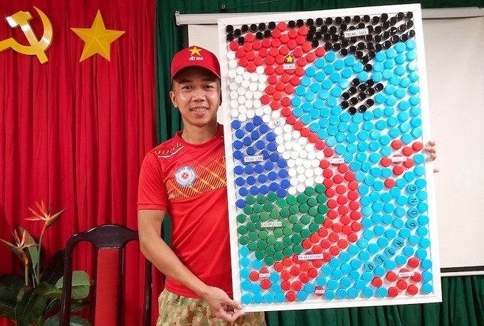 vietnamese blue beret doctors make vietnam map from bottle caps