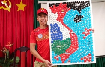 vietnamese blue beret doctors make vietnam map from bottle caps