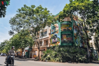 artful masion in hanoi with covid 19 themed communication graffiti catches attention