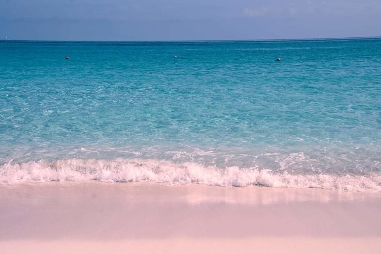 peachy pink sand beach a sense of romance during hot summer days