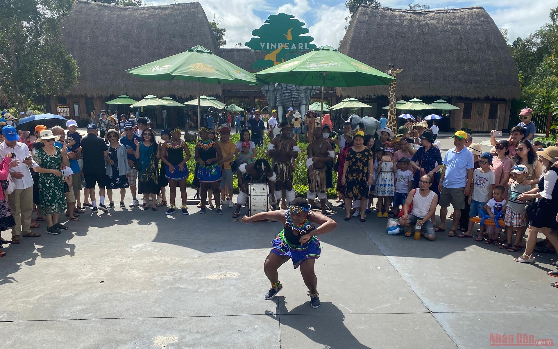 Zulu dancers dance to welcome visitors