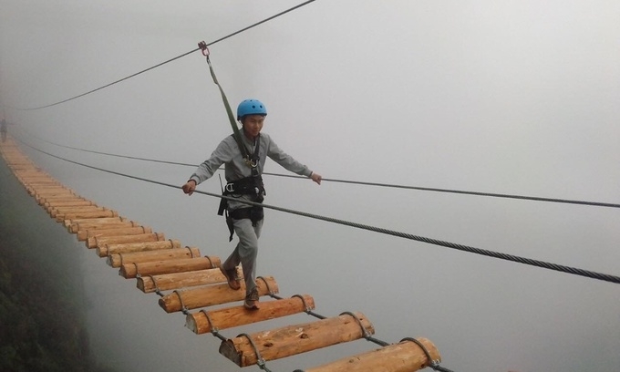 Walking on the bridge with clouds so close would make the experience more adventurous