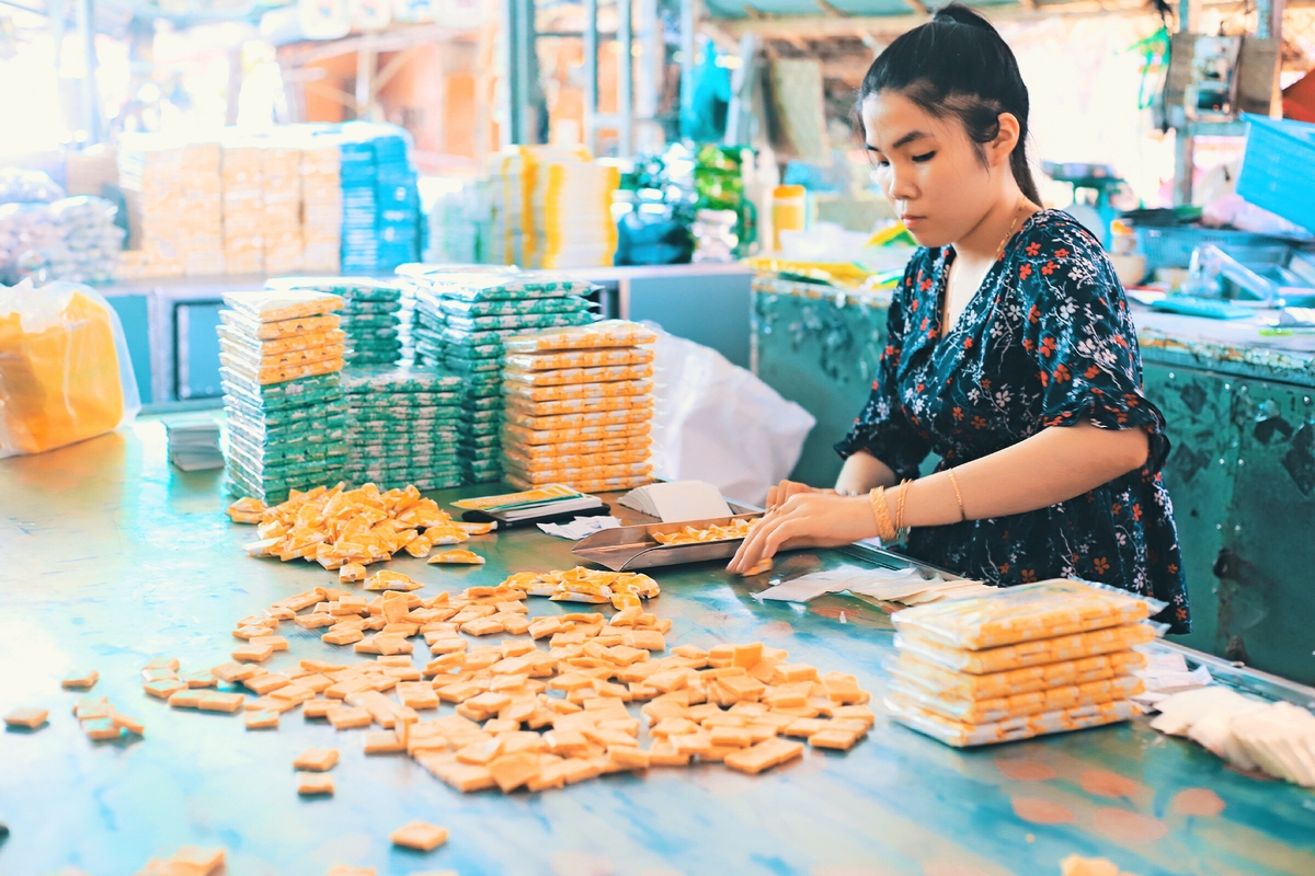 A local making coconut candies